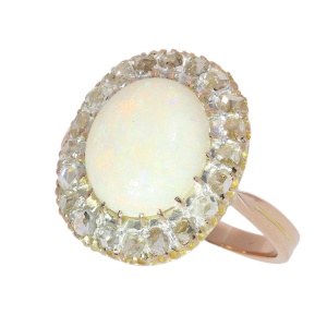 A Late Victorian Opal Ring with Rose Cut Diamond Halo, circa 1880